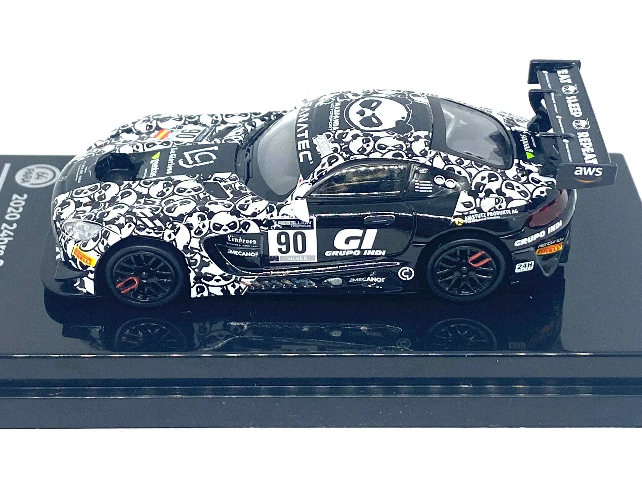 Diecast car in plastic sleeve