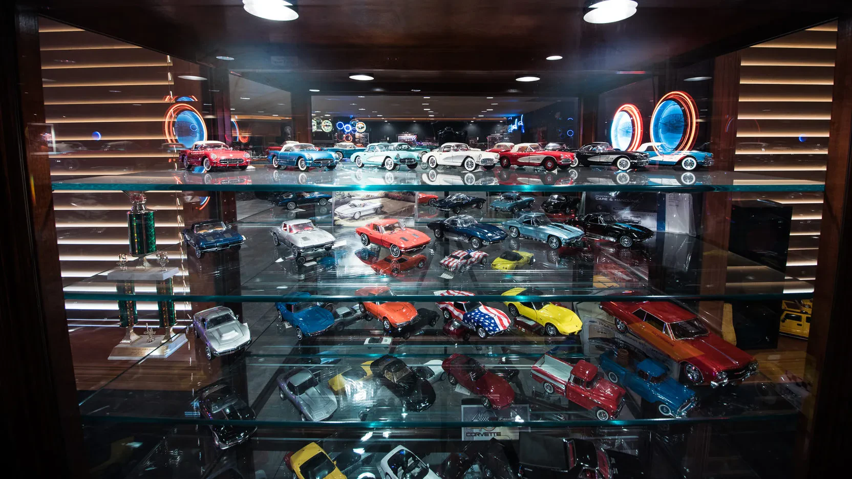 Diecast models displayed in a glass case