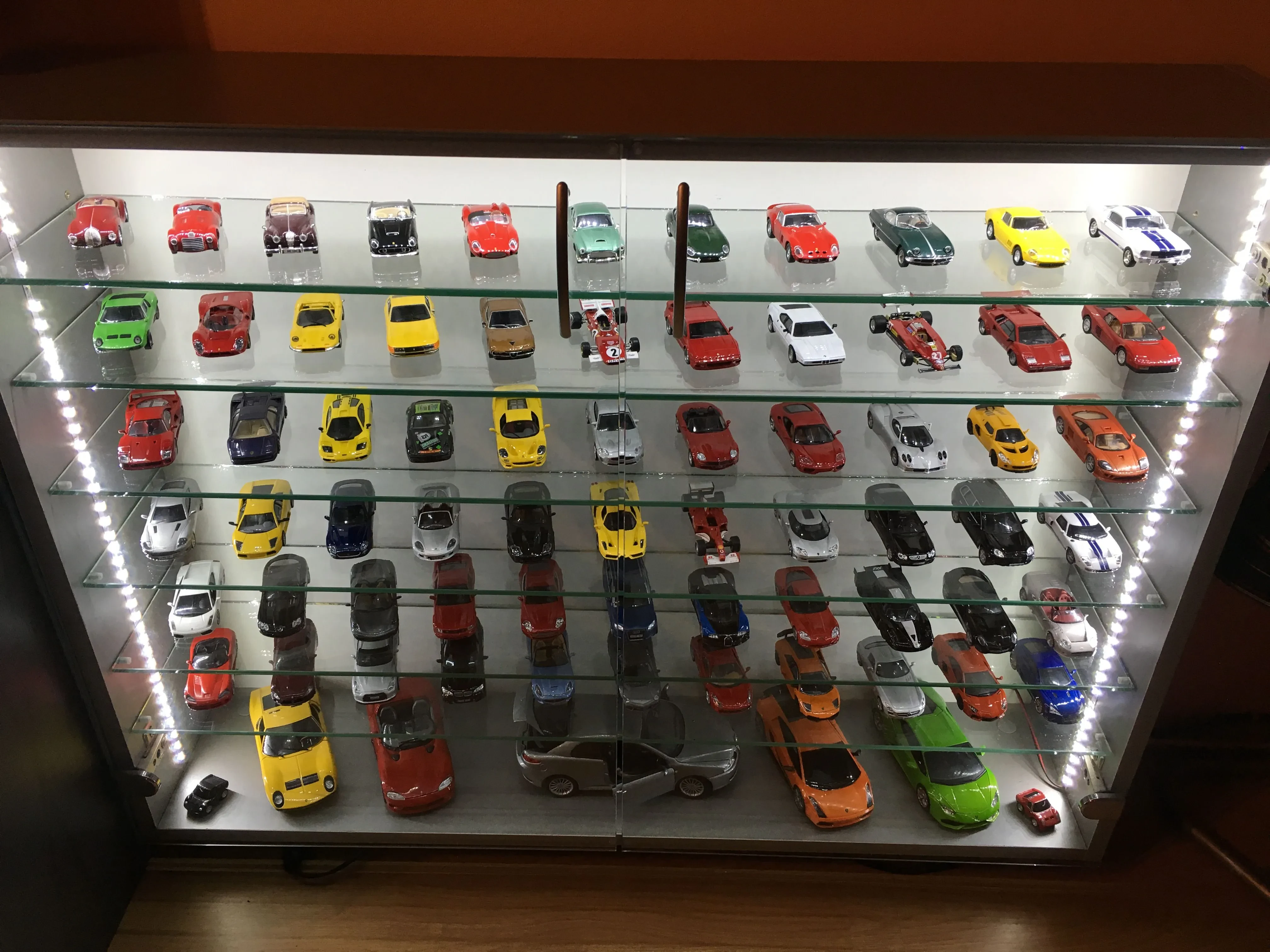 Diecast cars in display cases
