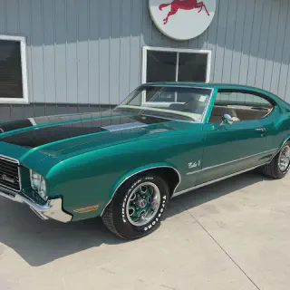 img/3266_sweet-rides-your-guide-to-the-1972-oldsmobile-cutlass-supreme-convertible-diecast.webp